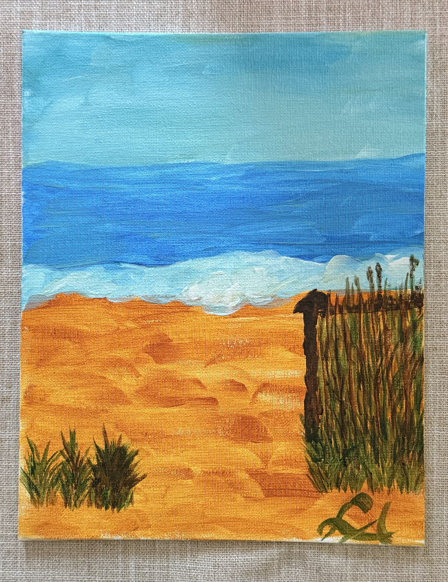 Canvas of a beach scene with waves, dunes, and grasses painted by a resident.
